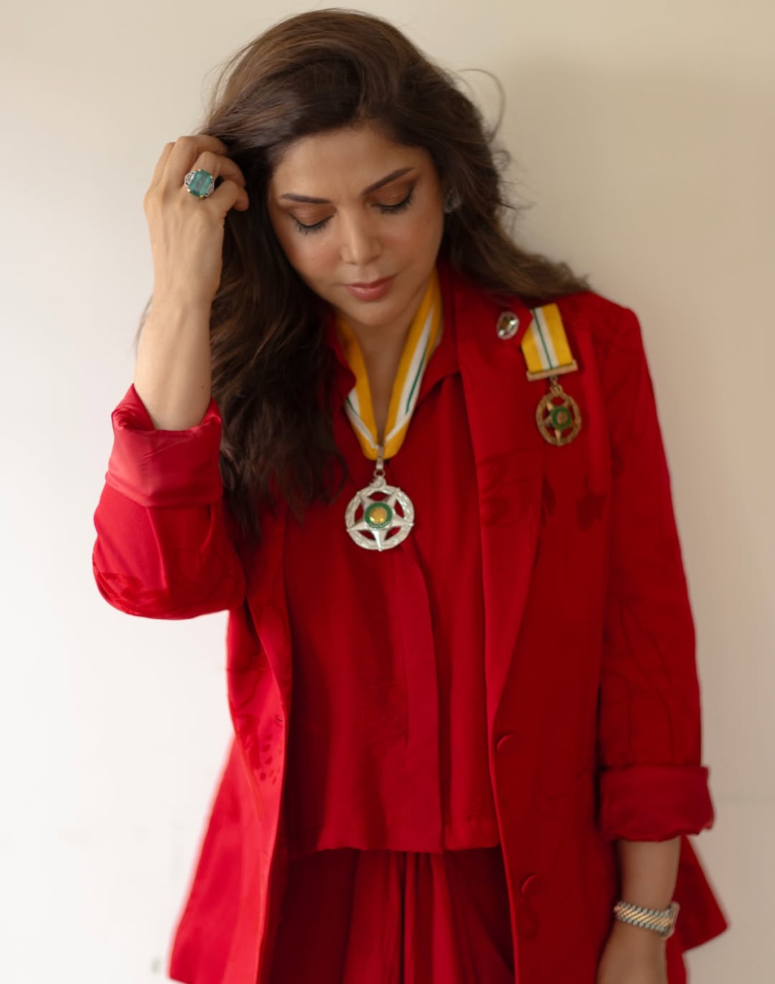Hadiqa Kiani smiling, wearing the Sitara-i-Imtiaz medal